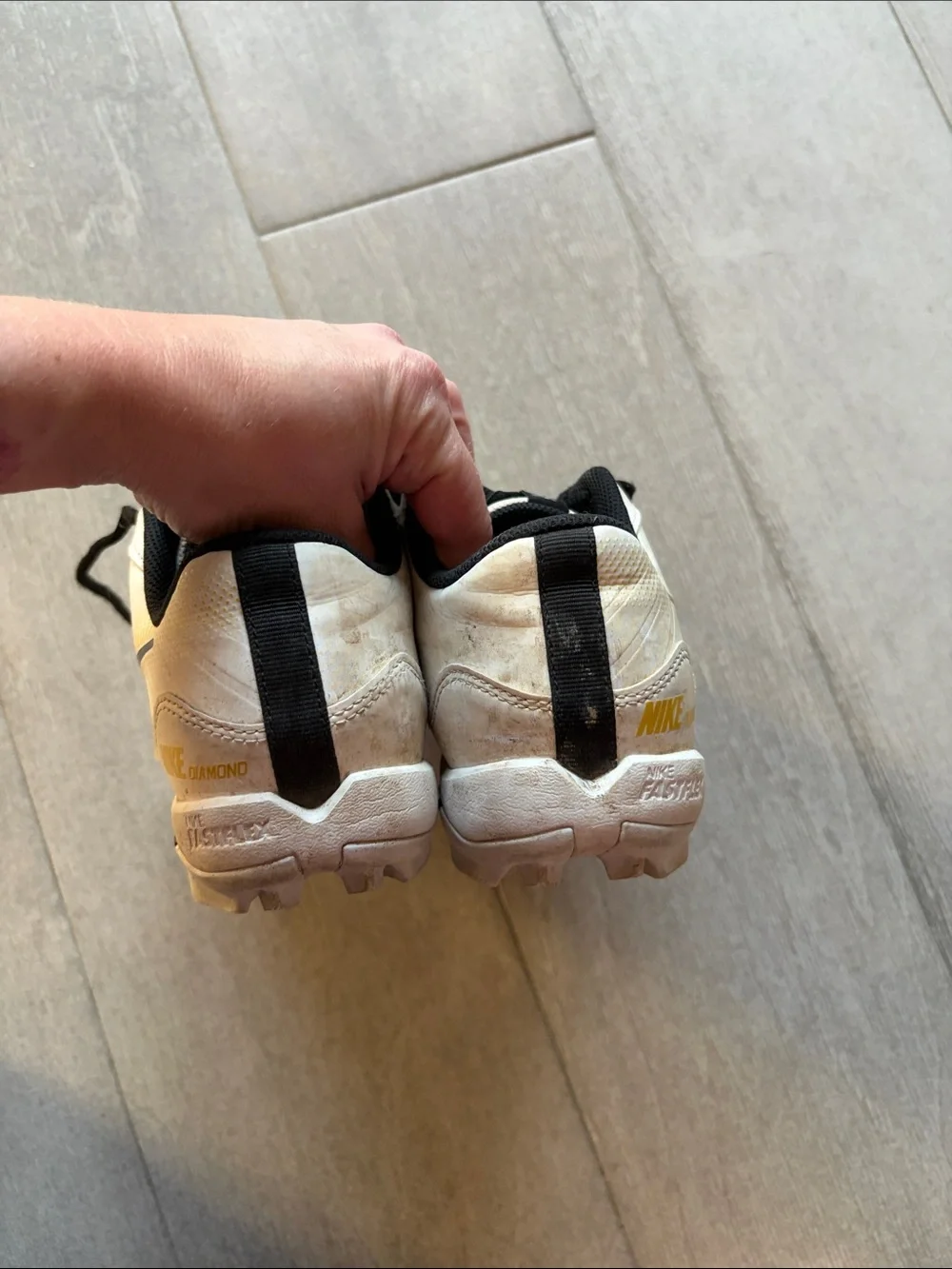 Nike White and Yellow Low-Top cleats with Black Laces